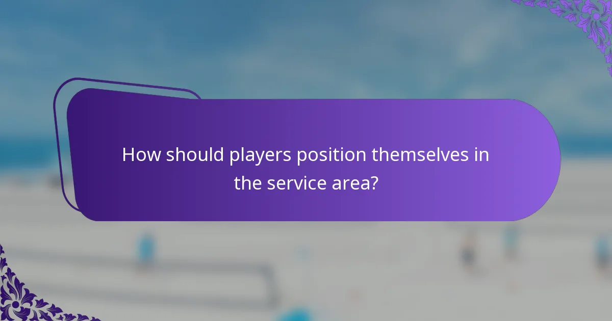 How should players position themselves in the service area?